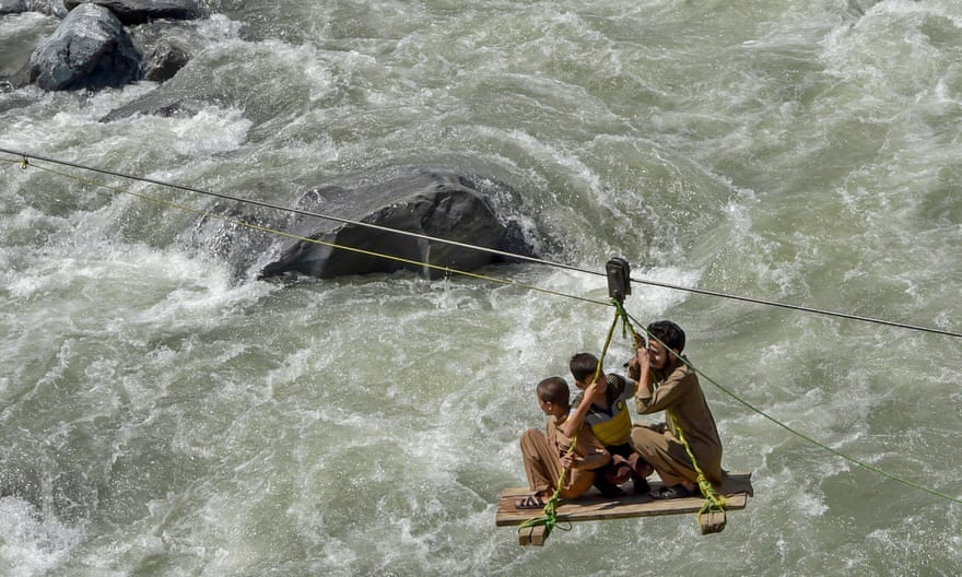 Crossing river on zipwire