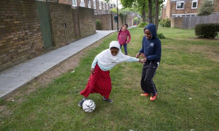 Neighbourly feel … kids play football at Cressingham Gardens housing estate, 2015.