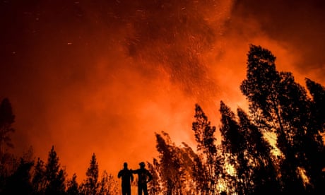FILES-PORTUGAL-ENVIRONMENT-FIRE<br>(FILES) In this file photo taken on July 21, 2019 firefighters monitor the progression of a wildfire at Amendoa in Macao, central Portugal. - Rising global temperature, rising sea levels, intensification of extreme events... The publication of the report of the Intergovernmental Panel on Climate Change (IPCC) is scheduled on August 9. (Photo by PATRICIA DE MELO MOREIRA / AFP) (Photo by PATRICIA DE MELO MOREIRA/AFP via Getty Images)