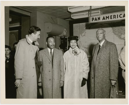 Martin Luther King Jr and his wife Coretta greeted by the Rev Adam Clayton Powell Jr (left) and labor leader A Philip Randolph (right) at the Pan American World Airways terminal, in New York City