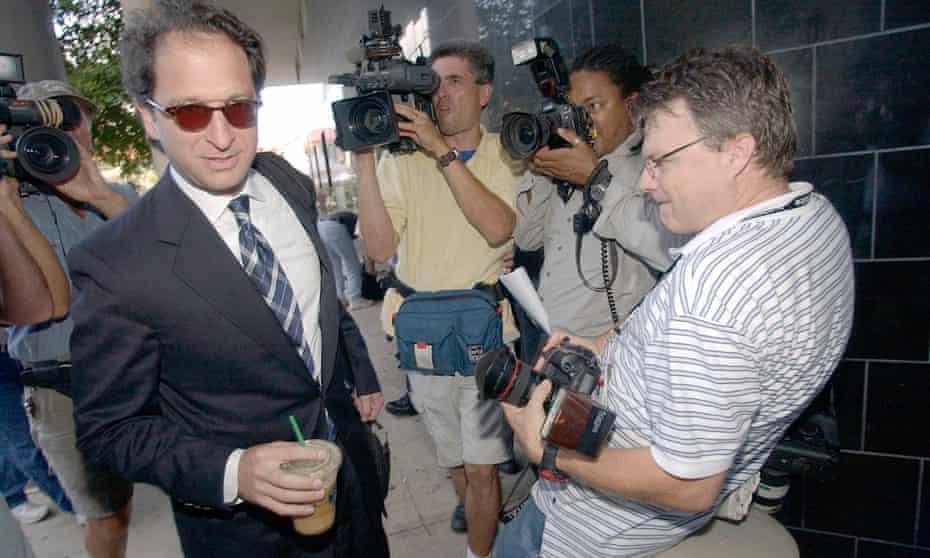 Andrew Weissmann wades through the media, during proceedings against Enron CEO Kenneth Lay in Houston in 2004.