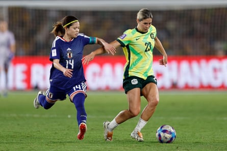 Australia’s Kyra Cooney-Cross and Japan’s Yui Hasegawa fight for the ball
