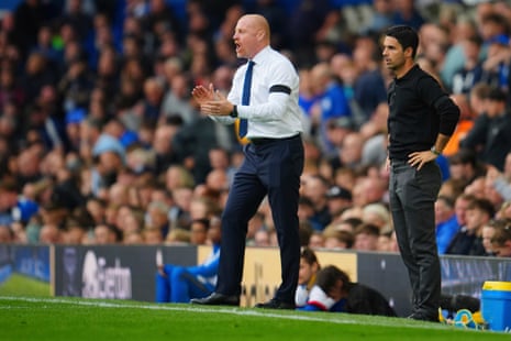 Everton's head coach Sean Dyche, left, gestures as Arsenal's manager Mikel Arteta looks on.