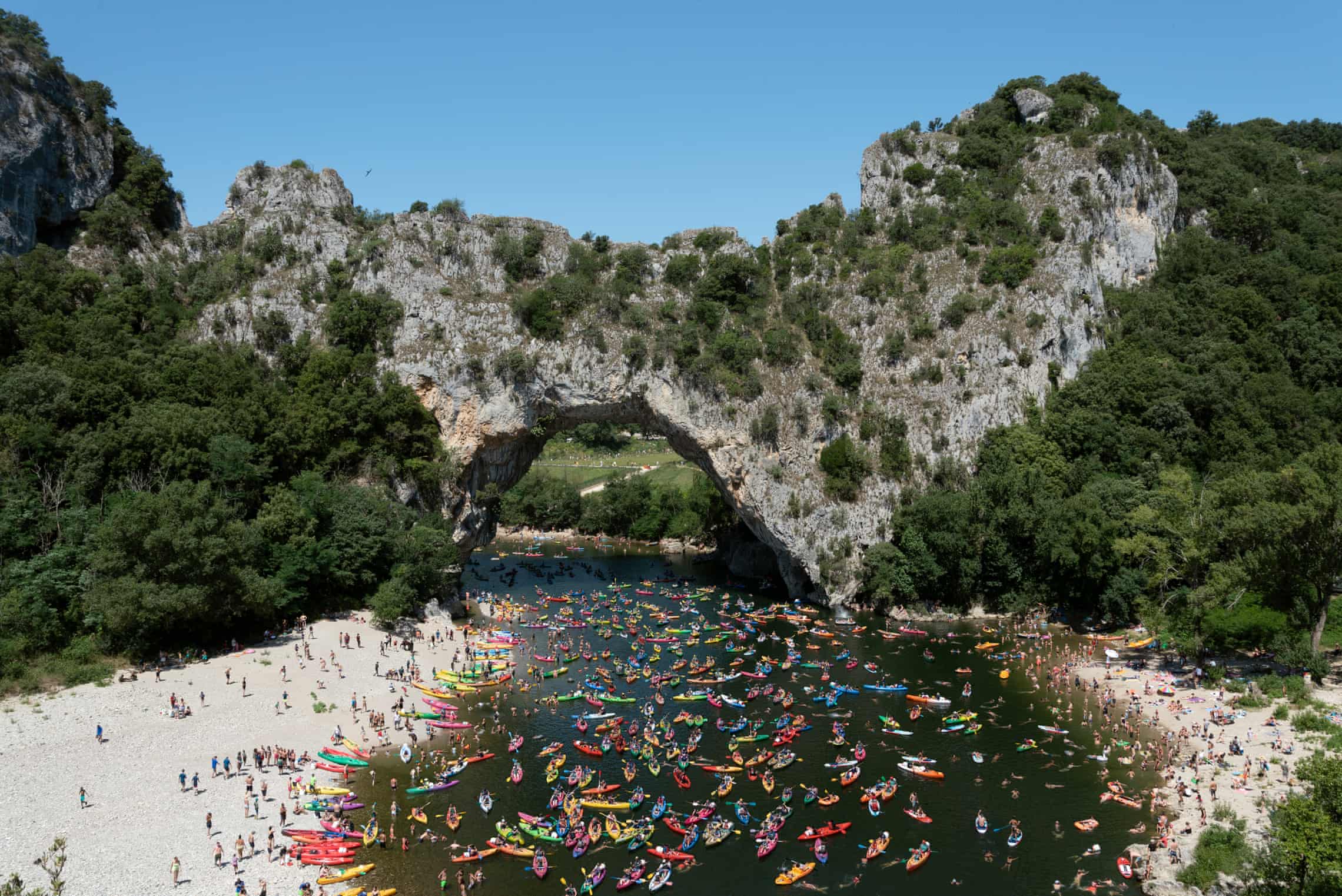 Paddle your own canoe … composite image of Pont d'Arc, Gorges de l'Ardèche, France, July 2021. Photograph: Natacha de Mahieu