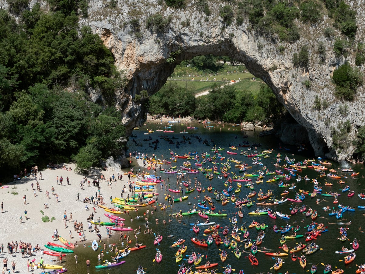 Wish you weren't here: the photos that show an hour in the life of 'quiet' tourist hotspots | Travel | The Guardian