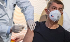Czech Prime Minister Andrej Babis receives an injection of the Pfizer-BioNTech COVID-19 vaccine at the Military University Hospital in Prague