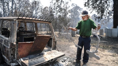 Queensland and NSW fires: residents survey 'heartbreaking' damage – video