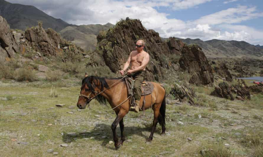 A bare-chested Vladimir Putin on horseback.