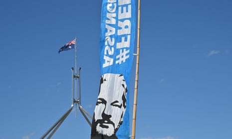 Julian Assange supporters hold a banner backing the Wikileaks founder outside Parliament House in Canberra last month.