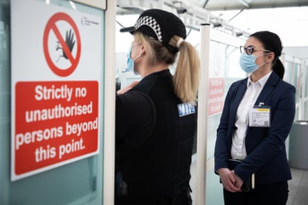 Cristina Huddleston, a director of the charity Justice and Care, at a London airport during a police operation to identify victims of human trafficking and slavery.