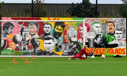 Caoimhín Kelleher trains in front of the goalkeeper mural at Liverpool training centre last November.
