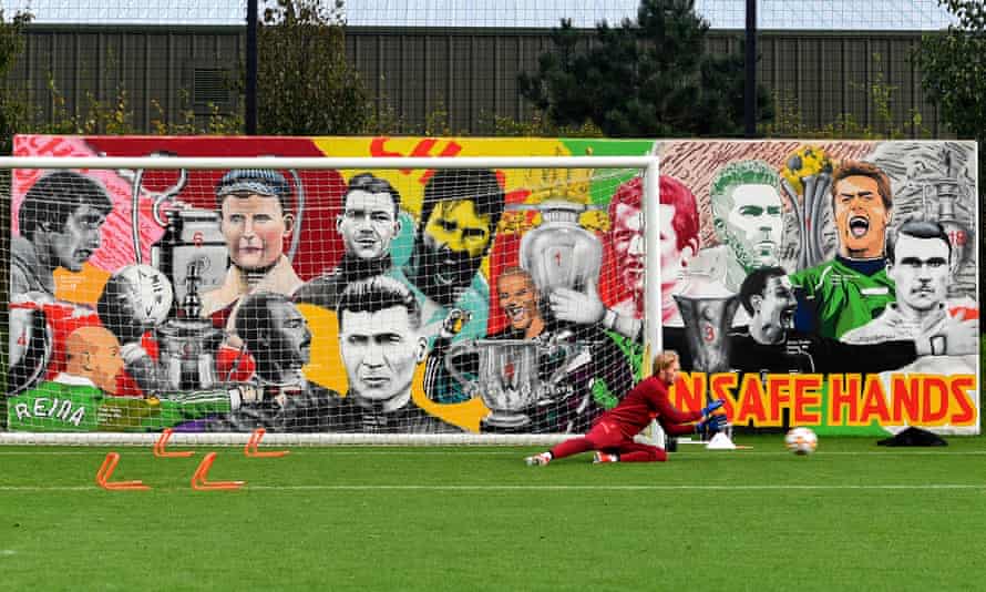 Caoimhín Kelleher: from childhood striker to Liverpool’s cup final keeper | Liverpool 2 Caoimhín Kelleher trains in front of the goalkeeper mural at Liverpool training centre last November.