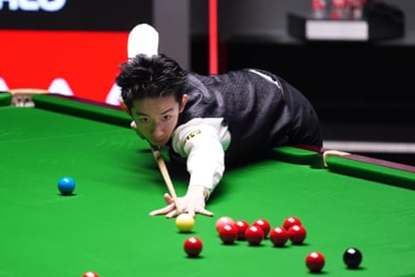 Wu Yize during his match against Shaun Murphy (not pictured) on day sixteen