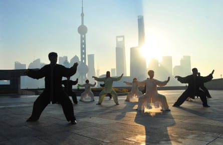 People practise Tai Chi in Shanghai in the morning