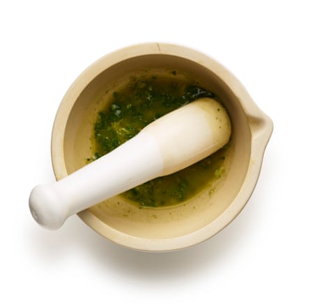 Make a dressing by grinding the garlic, salt, anchovies and basil in a mortar, then add oil and vinegar.