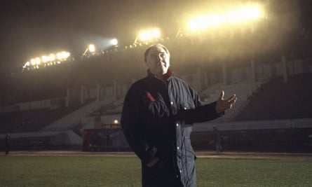 Scotland’s manager Craig Brown inspects the floodlight before the World Cup qualifier between Estonia and Scotland.