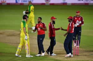 Marsh, congratulated by Jordan after winning the match.