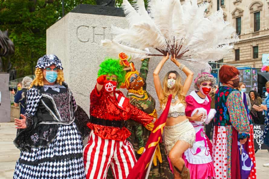 Panto dames march to Parliament Square in London calling for the government to support British theatres during the coronavirus crisis.