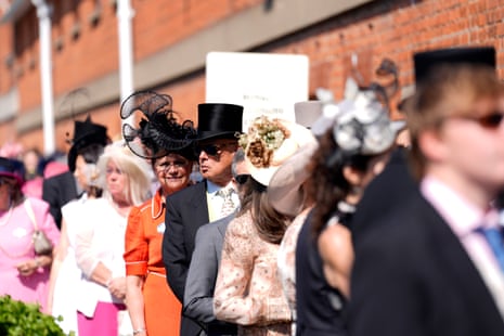 Queuing to get in at Royal Ascot, where the gates have just opened.