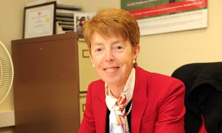 Paula Vennells smiling and sitting at a desk