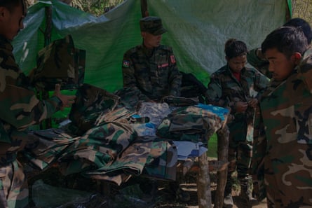 CNDF soldiers receiving new fatigues at a training facility in Falam township, Chin state