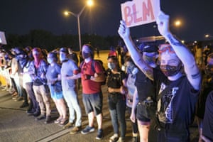 Demonstrators block the I75 highway in Atlanta on Saturday.