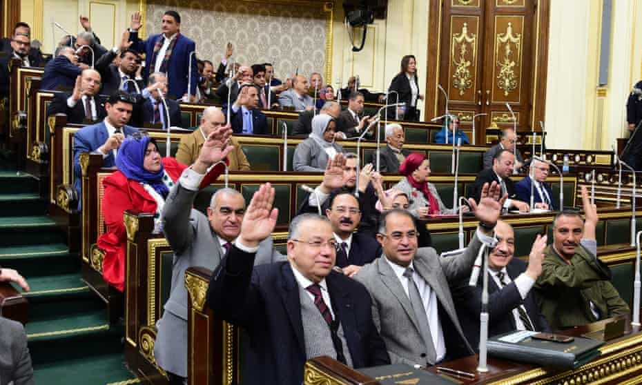 Egyptian lawmakers vote in Cairo’s parliament on the proposed amendments