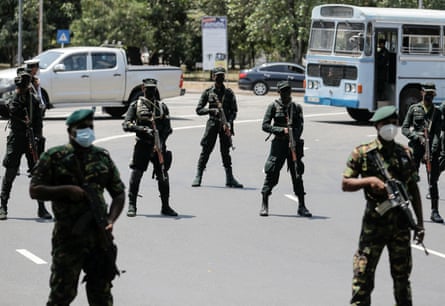 Sri Lankan army soldiers stand guard near Independence Square in Colombo.