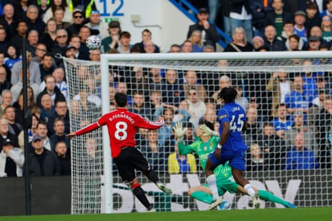 Bruno Fernandes watches his shot fly high over the goal as the goalkeeper reacts
