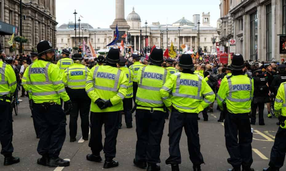Police block Extinction Rebellion protesters in Whitehall on Wednesday.