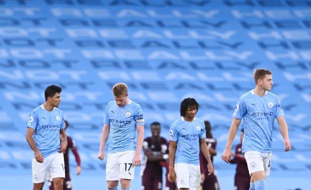 Manchester City’s players look dejected after Leicester City’s Youri Tielemans scores their fifth goal.