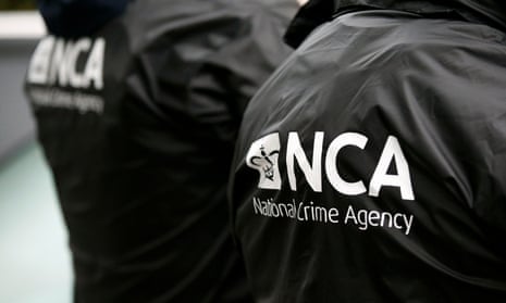 The NCA logo seen on jackets worn by agency officers