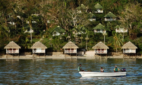 People commute on boats to Port Vila, capital city of the Pacific island nation of Vanuatu