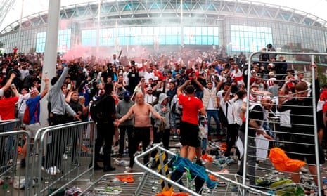 Fans outside Wembley Stadium celebrate after England took the lead in the Euro 2020 final against Italy