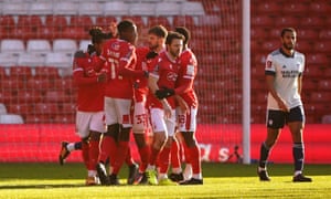 Nottingham Forest players celebrate the first goal of the day.