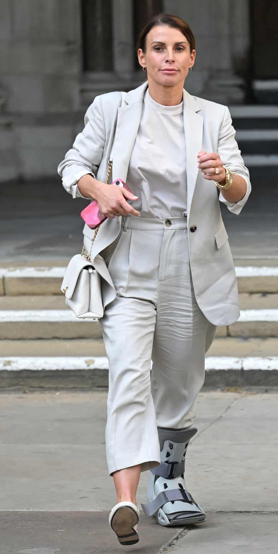 Coleen Rooney departs the Royal Courts of Justice, Strand on May 13, 2022 in London, England