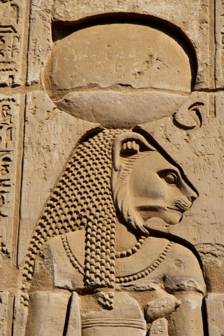 a relief of a cat deity