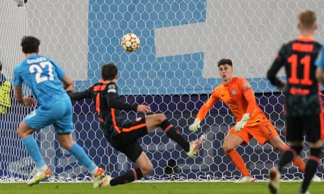 Zenit’s Magomed Ozdoev (left) scores his side’s third goal.