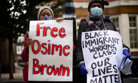 Demonstrators outside the Home Office call for the release of Osime Brown.