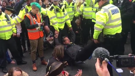 George Monbiot arrested for defying climate protest ban – video