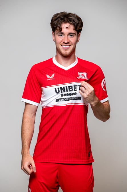 Hayden Hackney holds the Middlesbrough as he poses in a full kit