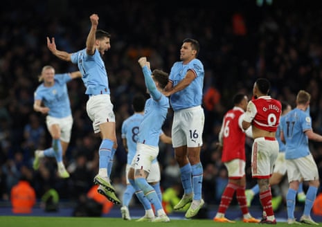 Manchester City’s John Stones celebrates scoring their second goal against Arsenal with teammates Rúben Dias and Rodri. City won the big clash at the Etihad Stadium 4-1