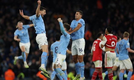 John Stones celebrates scoring Manchester City’s second goal against Arsenal in April 2023 with Ruben Dias and Rodri