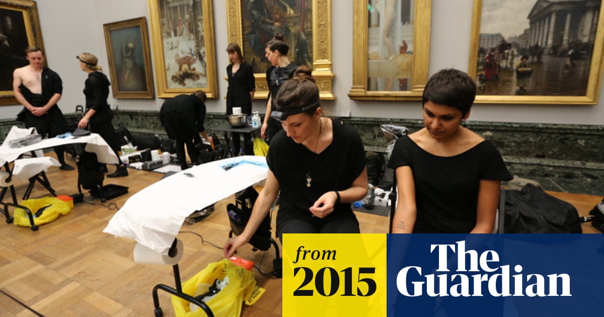 Climate change activists stage tattoo protest against BP at Tate