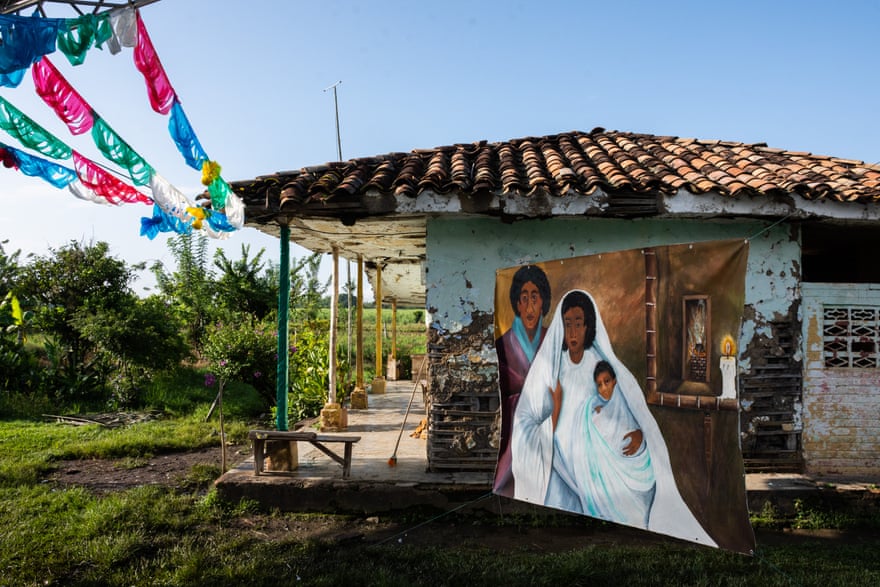 A painting of the Holy Family hangs in front of one of the oldest houses in Quinamayó
