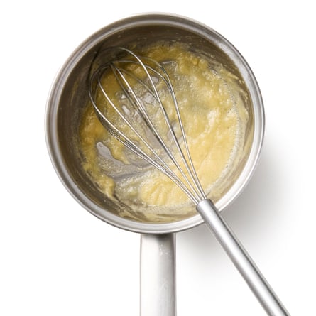 Melting the fat and stirring in the flour