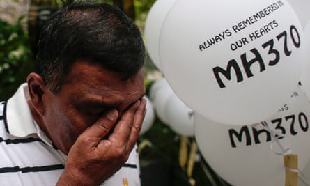 Zamani Zakaria grieves for his son and daughter-in-law at a ceremony to mark two years since MH370 disappeared.