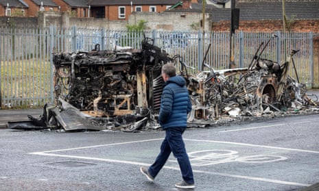 The remains of a burnt-out bus on the loyalist Shankill Road in Belfast on Thursday
