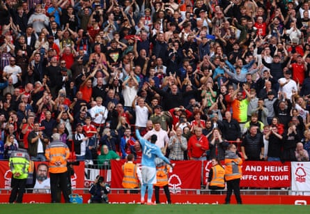 Forest fans celebrate with scorer Callum Hudson-Odoi after beating Liverpool at Anfield in September 2025.