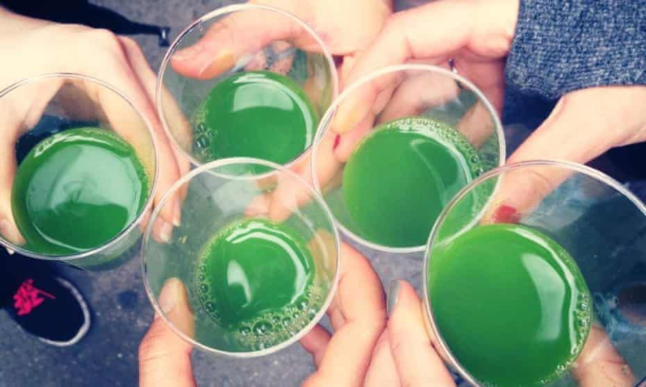 At a New York juice crawl, participants swap alcoholic shots for juice shots with names like ‘Dr Feelgood’ and ‘Kalefornia’. 